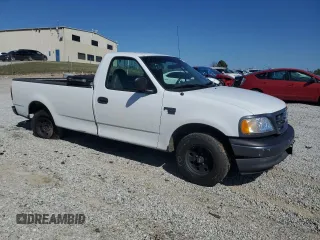 2003 Ford F-150 XL with VIN 2FTRF17WX3CB10461, listed as a Copart auction lot 48663195 with 94,954 mi miles and Salvage Title. Bid and sale history available at DreamBid. Image 4.