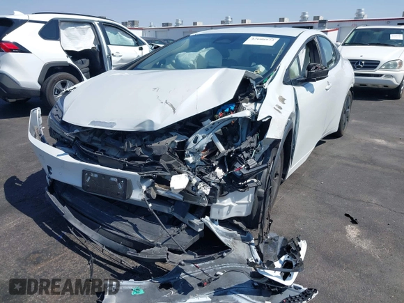 2023 Toyota Prius LE with VIN JTDACAAU7P3013923, listed as a IAAI auction lot 42600973 with 33,958 mi miles and . Bid and sale history available at DreamBid. Image 6.