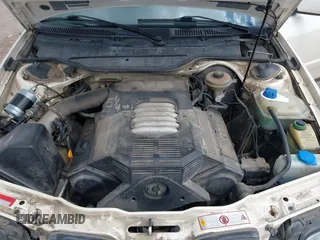 1996 Audi A6 z VIN WAUJA84A9TN106938, wystawiony jako IAAI lot #42287751 z przebiegiem 163 427 mil mil oraz . Historia ofert i sprzedaży dostępna na DreamBid. Obrazek 10.
