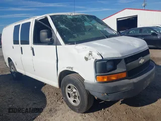 2005 Chevrolet Express Cargo with VIN 1GCFG15X351206710, listed as a IAAI auction lot 40946502 with 242,421 mi miles and . Bid and sale history available at DreamBid. Image 1.