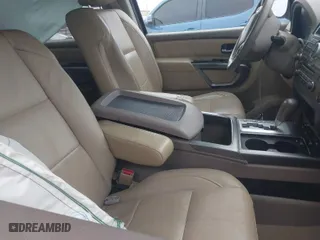 2015 Nissan Armada SV with VIN 5N1BA0ND7FN612818, listed as a IAAI auction lot 41459324 with 100,326 mi miles. Bid and sale history available at carsss.com. Image 5.