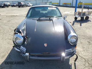 1971 Porsche 911 with VIN 9111120590, listed as a Copart auction lot 52559665 with 44,582 mi miles and Salvage title. Bid and sale history available at DreamBid. Image 5.