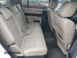 2009 Ford Flex SEL z VIN 2FMDK52CX9BA09974, wystawiony jako Copart lot #57184765 z przebiegiem 184 769 mil mil oraz Szkoda całkowita • Salvage title. Historia ofert i sprzedaży dostępna na DreamBid. Obrazek 11.