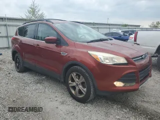2014 Ford Escape SE with VIN 1FMCU9GXXEUD76953, listed as a Copart auction lot 56340015 with 118,327 mi miles and Salvage title. Bid and sale history available at DreamBid. Image 4.