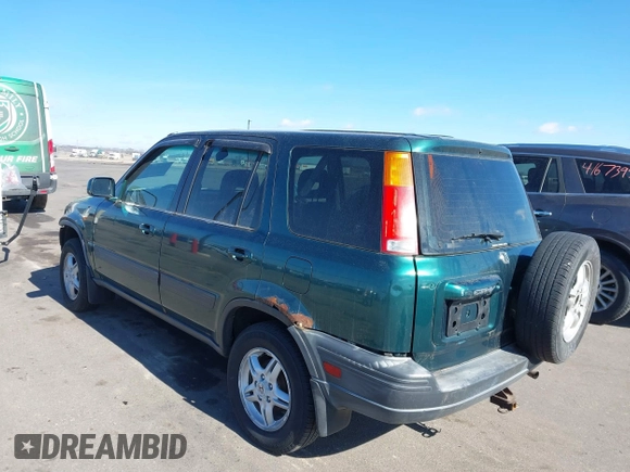 2000 Honda CR-V EX with VIN JHLRD176XYC035377, listed as a IAAI auction lot 41694054 with 196,985 mi miles. Bid and sale history available at carsss.com. Image 3.