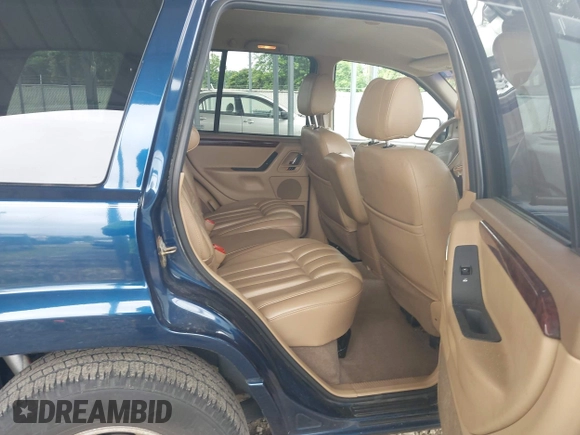 2000 Jeep Grand Cherokee Limited with VIN 1J4GW58S9YC347699, listed as a IAAI auction lot 42545373 with 118,566 mi miles and . Bid and sale history available at DreamBid. Image 8.