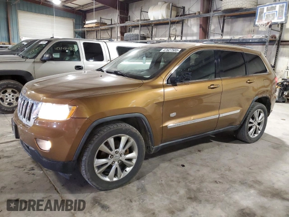 2011 Jeep Grand Cherokee Laredo with VIN 1J4RR4GG6BC675290, listed as a Copart auction lot 47627585 with 142,195 mi miles and Salvage Title. Bid and sale history available at carsss.com. Image 1.