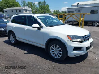 2012 Volkswagen Touareg Lux with VIN WVGEF9BP9CD008352, listed as a IAAI auction lot 42731013 with 116,302 mi miles and . Bid and sale history available at DreamBid. Image 1.