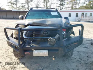 2014 Toyota Tacoma with VIN 3TMLU4EN3EM163162, listed as a IAAI auction lot 41930392 with 167,368 mi miles and . Bid and sale history available at DreamBid. Image 13.