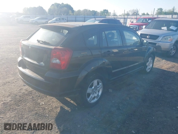 2008 Dodge Caliber SE with VIN 1B3HB28B58D776158, listed as a IAAI auction lot 41872879 with 197,843 mi miles and . Bid and sale history available at DreamBid. Image 4.