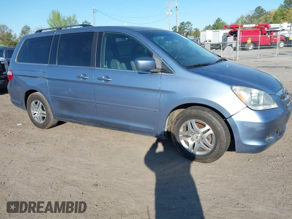 2005 Honda Odyssey EX-L with VIN 5FNRL38605B037065, listed as a IAAI auction lot 42042666 with 228,908 mi miles. Bid and sale history available at carsss.com. Image 6.