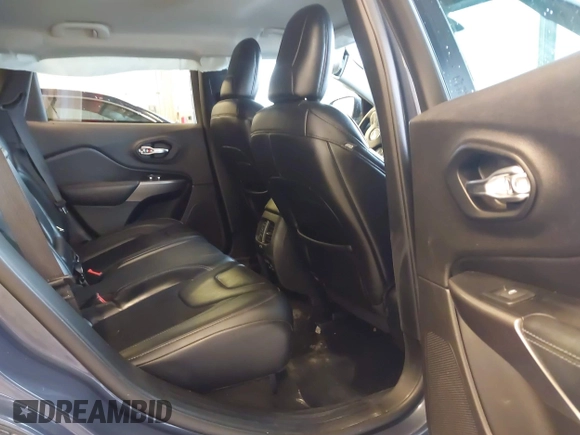 2019 Jeep Cherokee Latitude Plus with VIN 1C4PJMLX0KD361879, listed as a IAAI auction lot 40435950 with 148,830 mi miles. Bid and sale history available at carsss.com. Image 8.