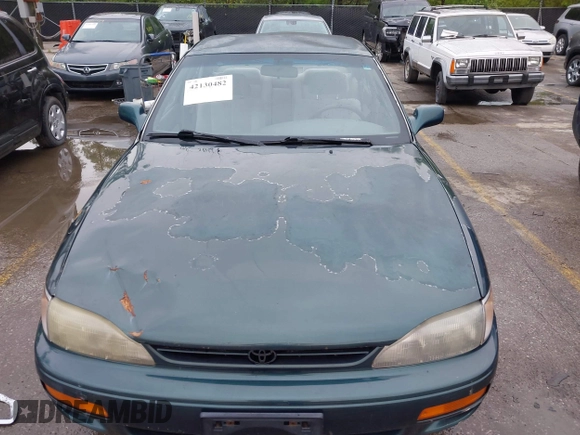 1996 Toyota Camry DX with VIN JT2BG12K5T0346311, listed as a IAAI auction lot 42130482 with 214,872 mi miles. Bid and sale history available at carsss.com. Image 6.
