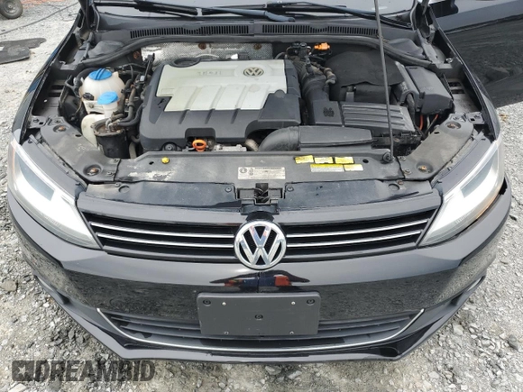 2014 Volkswagen Jetta Comfortline с VIN 3VWDL7AJ2EM366052, выставлен на аукционе Copart как лот 69010344 с пробегом 210 092 миль миль и Списание • Salvage title. История ставок и продаж доступна на DreamBid. Изображение 11.