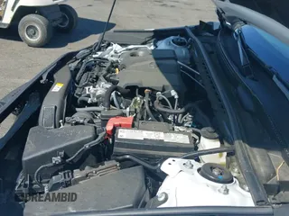 2024 Toyota Camry SE with VIN 4T1T11AK3RU881570, listed as a IAAI auction lot 43166508 with 10,058 mi miles and . Bid and sale history available at DreamBid. Image 19.