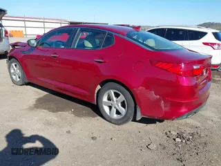 2014 Kia Optima LX with VIN 5XXGM4A72EG272724, listed as a IAAI auction lot 41828285 with 136,996 mi miles. Bid and sale history available at carsss.com. Image 3.