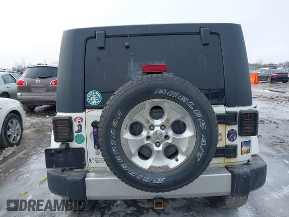 2010 Jeep Wrangler Unlimited Sahara with VIN 1J4HA5H19AL177179, listed as a IAAI auction lot 41565342 with 181,392 mi miles. Bid and sale history available at carsss.com. Image 17.