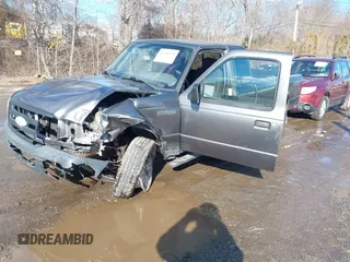 2006 Ford Ranger XL with VIN 1FTZR15E96PA43971, listed as a IAAI auction lot 41464878 with 195,461 mi miles. Bid and sale history available at carsss.com. Image 2.