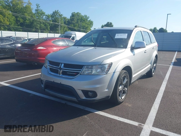 2013 Dodge Journey SXT with VIN 3C4PDCBG2DT661360, listed as a IAAI auction lot 42742522 with 155,973 mi miles and . Bid and sale history available at DreamBid. Image 2.