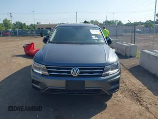2021 Volkswagen Tiguan S with VIN 3VV0B7AX3MM038342, listed as a IAAI auction lot 42545665 with 66,809 mi miles and . Bid and sale history available at DreamBid. Image 13.