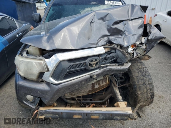 2014 Toyota Tacoma with VIN 5TFMU4FN3EX025697, listed as a Copart auction lot 62146895 with 133,028 mi miles and Salvage title. Bid and sale history available at DreamBid. Image 11.