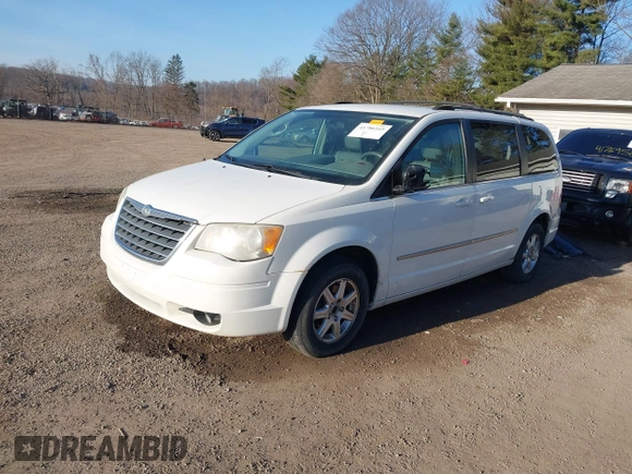 2009 Chrysler Town & Country Touring with VIN 2A8HR54179R631851, listed as a IAAI auction lot 41786165 with 126,988 mi miles and . Bid and sale history available at DreamBid. Image 2.