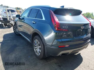 2019 Cadillac XT4 AWD Premium Luxury with VIN 1GYFZDR40KF129461, listed as a IAAI auction lot 42531671 with 60,731 mi miles and . Bid and sale history available at DreamBid. Image 3.