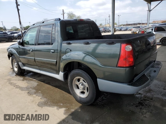 2002 Ford Explorer Sport Trac Value with VIN 1FMZU67E72UC81009, listed as a Copart auction lot 54929835 with 130,862 mi miles and Salvage title. Bid and sale history available at DreamBid. Image 2.
