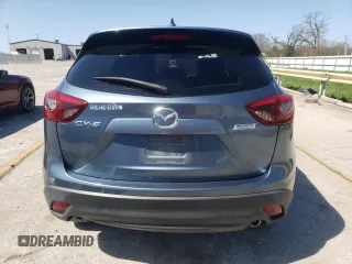 2016 Mazda CX-5 Grand Touring with VIN JM3KE2DY9G0724096, listed as a Copart auction lot 52249675 with 47,860 mi miles and Salvage Title. Bid and sale history available at carsss.com. Image 6.