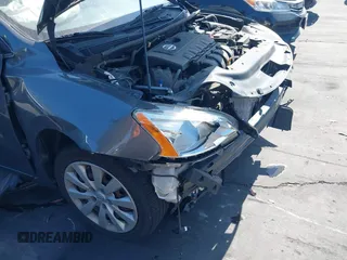 2015 Nissan Sentra SV z VIN 3N1AB7AP8FL629426, wystawiony jako IAAI lot #42304010 z przebiegiem 51 559 mil mil oraz . Historia ofert i sprzedaży dostępna na DreamBid. Obrazek 13.
