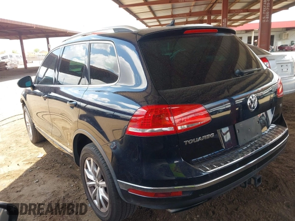 2016 Volkswagen Touareg Sport with VIN WVGEF9BP0GD012148, listed as a IAAI auction lot 42195030 with 95,984 mi miles and . Bid and sale history available at DreamBid. Image 3.