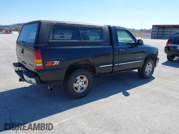 1999 Chevrolet Silverado 1500 LS with VIN 1GCEK14T9XZ213688, listed as a IAAI auction lot 41818993 with 192,743 mi miles. Bid and sale history available at carsss.com. Image 4.