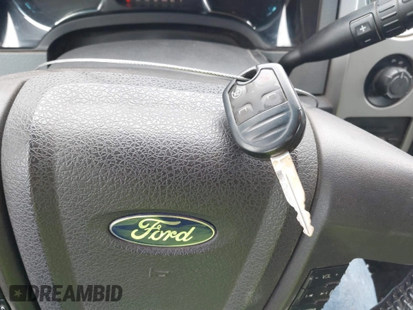 2013 Ford F-150 XL with VIN 1FTFW1EF7DKE70628, listed as a IAAI auction lot 42115322 with 246,593 mi miles and . Bid and sale history available at DreamBid. Image 11.