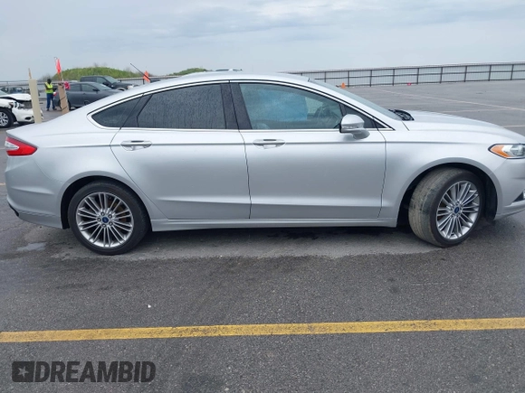 2013 Ford Fusion SE with VIN 3FA6P0H98DR253944, listed as a IAAI auction lot 42525128 with 104,081 mi miles and . Bid and sale history available at DreamBid. Image 13.