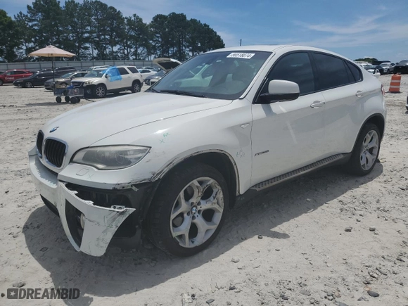 2014 BMW X6 xDrive35i with VIN 5UXFG2C53E0C44534, listed as a Copart auction lot 56518074 with 141,924 mi miles and Salvage Title. Bid and sale history available at carsss.com. Image 1.