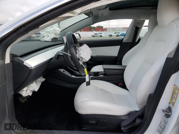 2019 Tesla Model 3 Mid Range z VIN 5YJ3E1EAXKF429382, wystawiony jako Copart lot #56172625 z przebiegiem Nie podano mil oraz Szkoda całkowita • Salvage title. Historia ofert i sprzedaży dostępna na DreamBid. Obrazek 7.