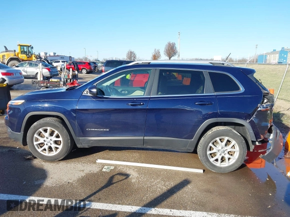 2015 Jeep Cherokee Latitude with VIN 1C4PJMCS0FW583658, listed as a IAAI auction lot 41106819 with 101,849 mi miles. Bid and sale history available at carsss.com. Image 14.
