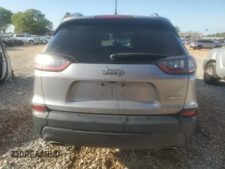 2019 Jeep Cherokee Latitude with VIN 1C4PJLCX4KD110812, listed as a Copart auction lot 52508065 with 126,861 mi miles and Salvage title. Bid and sale history available at DreamBid. Image 6.