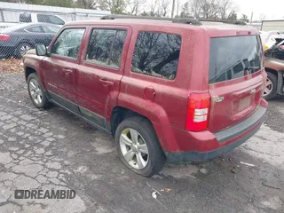 2013 Jeep Patriot Latitude with VIN 1C4NJPFA3DD237804, listed as a IAAI auction lot 41876591 with 73,852 mi miles. Bid and sale history available at carsss.com. Image 3.