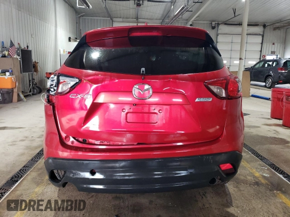 2014 Mazda CX-5 Touring with VIN JM3KE2CY4E0308973, listed as a Copart auction lot 53875605 with 0 mi miles and Salvage Title. Bid and sale history available at carsss.com. Image 6.