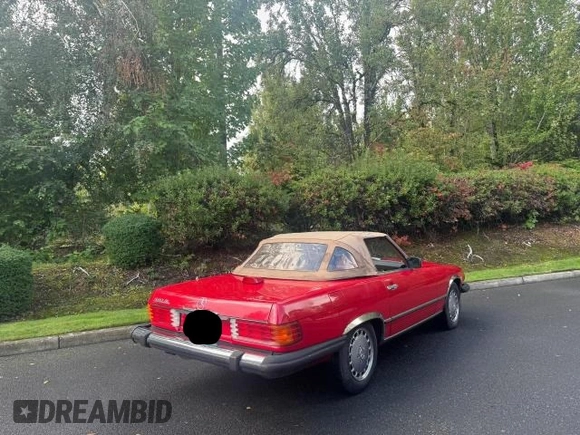 1987 Mercedes-Benz 560 SL z VIN WDBBA48D8HA065591, wystawiony jako Copart lot #73538474 z przebiegiem 119 516 mil mil oraz Czysty tytuł • Clean title. Historia ofert i sprzedaży dostępna na DreamBid. Obrazek 4.