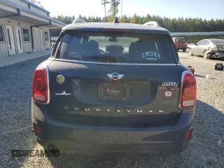 2018 MINI Countryman Cooper S E with VIN WMZYU7C47J3E56451, listed as a Copart auction lot 77193144 with 60,949 mi miles and Salvage Title. Bid and sale history available at carsss.com. Image 6.