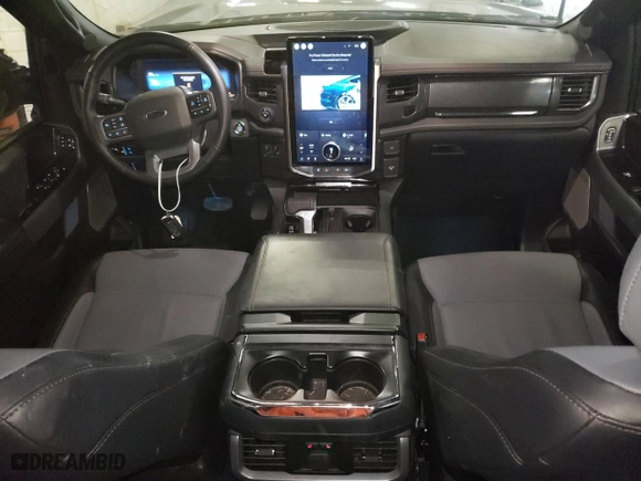 2022 Ford F-150 Lightning Pro with VIN 1FT6W1EV7NWG10033, listed as a Copart auction lot 81516533 with 11,282 mi miles and Salvage Title. Bid and sale history available at carsss.com. Image 8.
