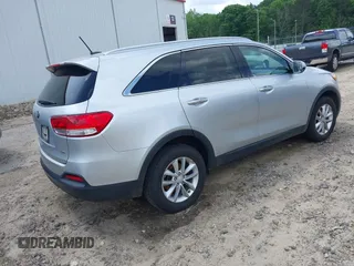 2017 Kia Sorento LX with VIN 5XYPG4A34HG265018, listed as a IAAI auction lot 42165365 with Not Provided miles. Bid and sale history available at carsss.com. Image 4.