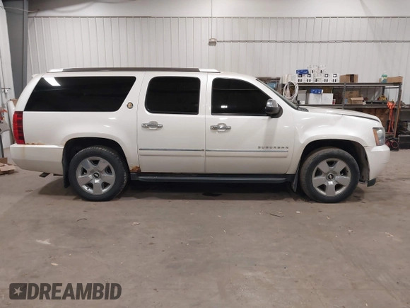 2010 Chevrolet Suburban LTZ with VIN 1GNUKKE31AR290571, listed as a IAAI auction lot 40948006 with 163,758 mi miles. Bid and sale history available at carsss.com. Image 12.