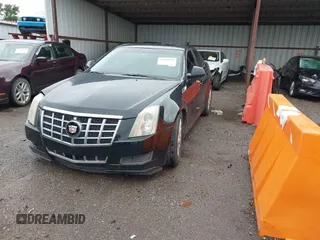 2012 Cadillac CTS with VIN 1G6DA5E58C0112066, listed as a IAAI auction lot 42128544 with 150,860 mi miles and . Bid and sale history available at DreamBid. Image 2.