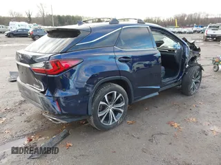 2017 Lexus RX with VIN 2T2BZMCAXHC063422, listed as a IAAI auction lot 41130585 with 63,883 mi miles. Bid and sale history available at carsss.com. Image 4.