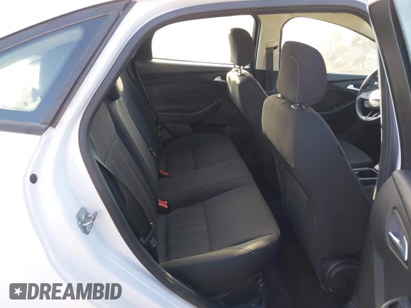 2018 Ford Focus SE z VIN 1FADP3F23JL328462, wystawiony jako IAAI lot #42068209 z przebiegiem 63 194 mil mil oraz . Historia ofert i sprzedaży dostępna na DreamBid. Obrazek 8.