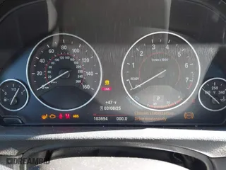 2016 BMW 3 Series 328i xDrive with VIN WBA8E3G58GNU02561, listed as a IAAI auction lot 41811408 with 103,694 mi miles. Bid and sale history available at carsss.com. Image 7.