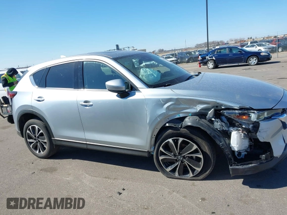 2023 Mazda CX-5 2.5 S Premium Package with VIN JM3KFBDM9P0173453, listed as a IAAI auction lot 41807979 with 34,156 mi miles. Bid and sale history available at carsss.com. Image 13.